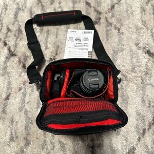 Canon Rebel Camera with Black and Red Case